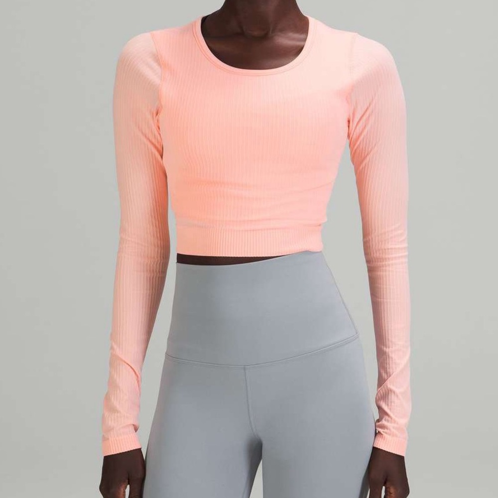 Lululemon Ebb to Street Long Sleeve Shirt,
Dew Pink, Size 10; crop workout top